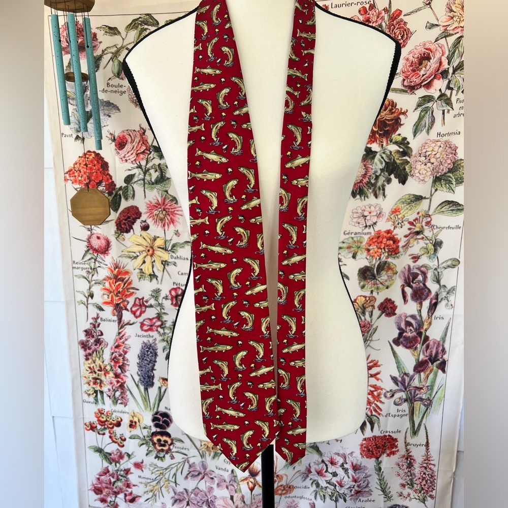 Rainbow trout neck tie by Alynn Neckwear. It is red with rainbow trout.